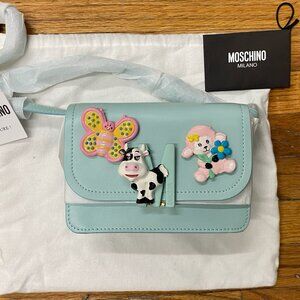 SOLD! SS22 MOSCHINO Couture Jeremy Scott Calico Turquoise Cow Sheep Shoulder Bag